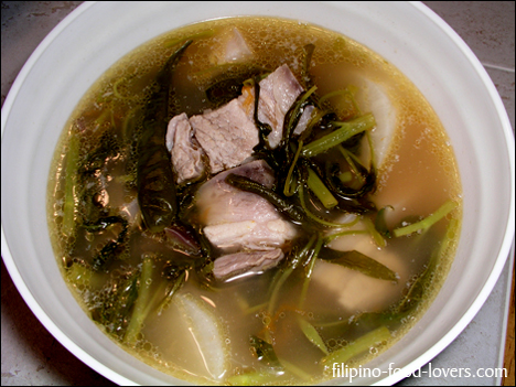 Sinigang na baboy in bowl with sabaw