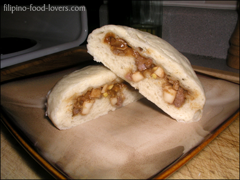 Sliced siopao on a plate