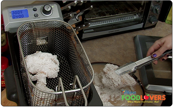 Placing Chicken into Fryer Basket